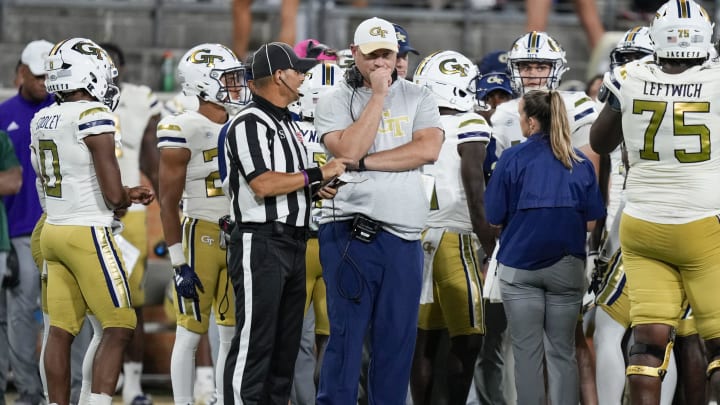 Sep 23, 2023; Winston-Salem, North Carolina, USA;  Georgia Tech Yellow Jackets head coach Brent Key talks with an official during the second half against the Wake Forest Demon Deacons at Allegacy Federal Credit Union Stadium. Mandatory Credit: Jim Dedmon-USA TODAY Sports