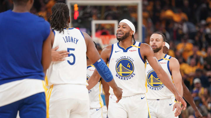 Apr 15, 2025; San Francisco, California, USA; Golden State Warriors guard Moses Moody (4) walks to towards the team bench during a timeout against the Memphis Grizzlies in the second quarter at the Chase Center. Mandatory Credit: Cary Edmondson-Imagn Images