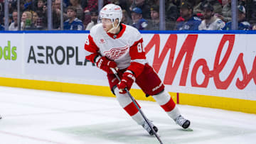 Feb 2, 2025; Vancouver, British Columbia, CAN; Detroit Red Wings forward Patrick Kane (88) handles the puck against the Vancouver Canucks in overtime at Rogers Arena. Mandatory Credit: Bob Frid-Imagn Images