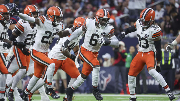 Jeremiah Owusu-Koramoah celebrates with teammates after an interception against the Houston Texans in 2023.  