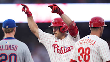 Jun 22, 2025; Philadelphia, Pennsylvania, USA; Philadelphia Phillies infielder Otto Kemp (4) reacts after hitting an RBI single against the New York Mets in the fourth inning at Citizens Bank Park. Mandatory Credit: Kyle Ross-Imagn Images