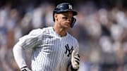 New York Yankees right fielder Aaron Judge (99) rounds the bases after hitting a two run home run for his 350th home run against the Chicago Cubs during the ninth inning at Yankee Stadium.