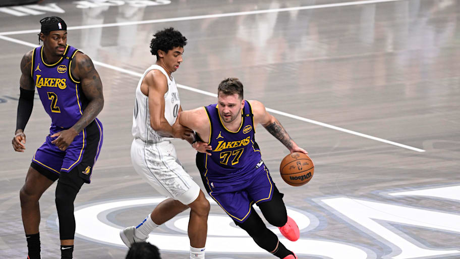 Los Angeles Lakers point guard/shooting guard Luka Dončić dribbles against the Dallas Mavericks.