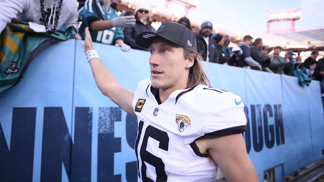 Nov 30, 2025; Nashville, Tennessee, USA;  Jacksonville Jaguars quarterback Trevor Lawrence (16) high fives fans following a game against the Tennessee Titans at Nissan Stadium. Mandatory Credit: Steve Roberts-Imagn Images