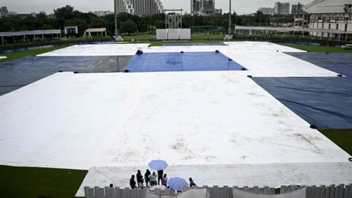 The covered pitch due to heavy rain at the start of the Afghanistan vs New Zealand test match at the Greater Noida Stadium