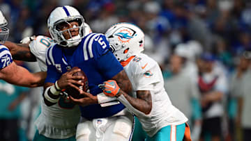 Benched Colts quarterback Anthony Richardson is sacked by Miami Dolphins cornerback Jalen Ramsey.