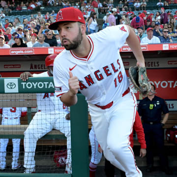 Jun 19, 2024; Anaheim, California, USA;  Los Angeles Angels first baseman Nolan Schanuel (18) runs on to the field for the game against the Milwaukee Brewers at Angel Stadium. Mandatory Credit: Jayne Kamin-Oncea-USA TODAY Sports