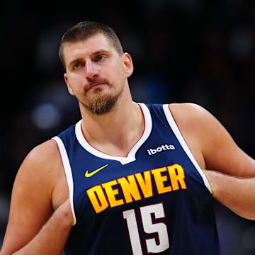 Nov 8, 2025; Denver, Colorado, USA; Denver Nuggets center Nikola Jokic (15) during the second half against the Indiana Pacers at Ball Arena. Mandatory Credit: Ron Chenoy-Imagn Images
