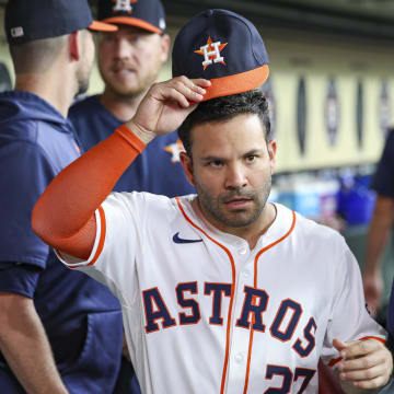 Jul 10, 2024; Houston, Texas, USA; Houston Astros second baseman Jose Altuve (27) walks in the dugout before the game against the Miami Marlins at Minute Maid Park