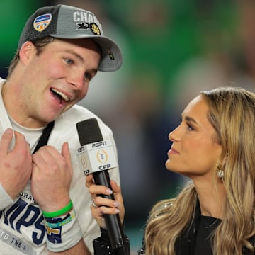 Jan 9, 2025; Miami, FL, USA; Notre Dame Fighting Irish quarterback Riley Leonard (13) celebrates defeating the Penn State Nittany Lions in the Orange Bowl at Hard Rock Stadium. 