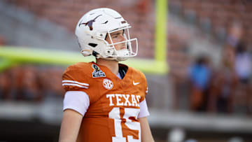 Dec 21, 2024; Austin, Texas, USA; Texas Longhorns quarterback Trey Owens (15) against the Clemson Tigers during the CFP National playoff first round at Darrell K Royal-Texas Memorial Stadium. Mandatory Credit: Mark J. Rebilas-Imagn Images