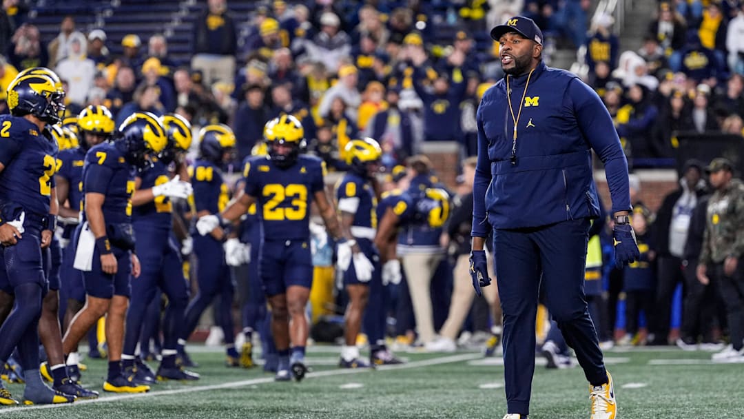 Michigan head coach Sherrone Moore watches warmup ahead of the Purdue game at Michigan Stadium in Ann Arbor on Saturday, November 1, 2025.