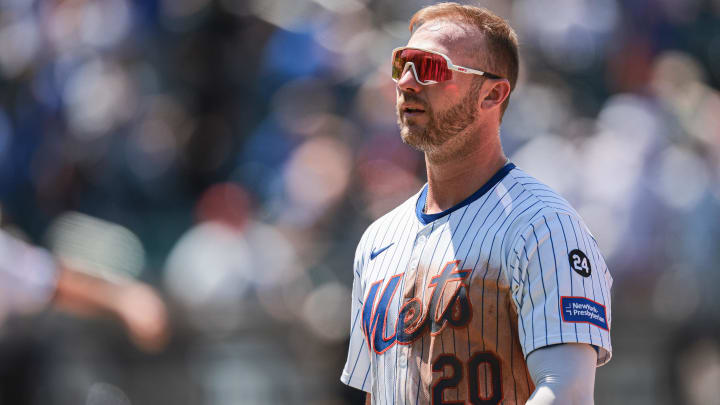 Jul 11, 2024; New York City, New York, USA; New York Mets first baseman Pete Alonso (20) walks back to the dug out during the fifth inning against the Washington Nationals at Citi Field. Mandatory Credit: Vincent Carchietta-USA TODAY Sports