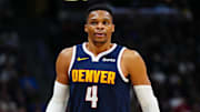 Dec 28, 2024; Denver, Colorado, USA; Denver Nuggets guard Russell Westbrook (4) looks on during the first quarter against the Detroit Pistons at Ball Arena. Mandatory Credit: Ron Chenoy-Imagn Images