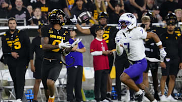 Arizona State wide receiver Jordyn Tyson (0) catches a pass against TCU defensive back Channing Canada (7) on his way to a touchdown during a game at Mountain America Stadium in Tempe, Ariz. on Sept. 26, 2025.
