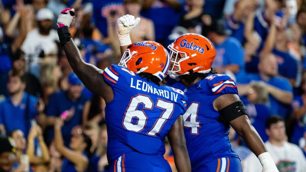 Florida Gators offensive linemen Richie Leonard IV and Micah Mazzccua celebrate a touchdown against Tennessee in 2023.