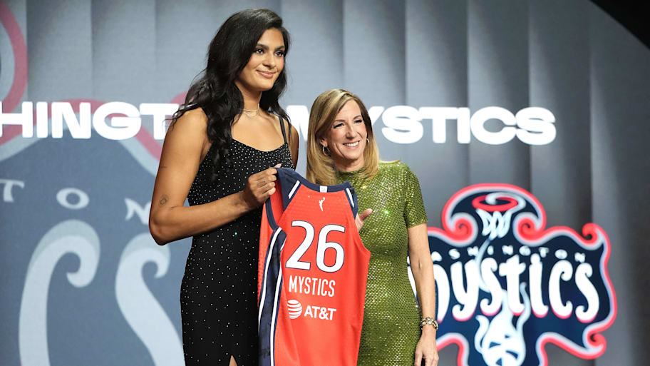 Lauren Betts poses with Cathy Engelbert at the WNBA draft. 