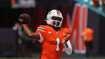 Sep 14, 2024; Miami Gardens, Florida, USA; Miami Hurricanes quarterback Cam Ward (1) throws the football before the game against the Ball State Cardinals at Hard Rock Stadium. Mandatory Credit: Sam Navarro-Imagn Images