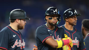 Aug 27, 2025; Miami, Florida, USA; Atlanta Braves designated hitter Ronald Acuna (13) walks toward first base after a hit by pitch against the Miami Marlins during the third inning at loanDepot Park. Mandatory Credit: Sam Navarro-Imagn Images