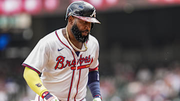 Sep 24, 2025; Cumberland, Georgia, USA; Atlanta Braves designated hitter Marcell Ozuna (20) reacts after hitting a home run against the Washington Nationals during the eighth inning at Truist Park. Mandatory Credit: Dale Zanine-Imagn Images