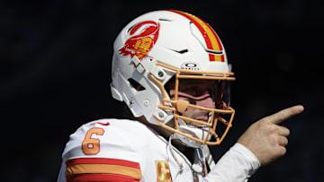 Oct 5, 2025; Seattle, Washington, USA; Tampa Bay quarterback Baker Mayfield (6) wearing the Buccaneers throwback helmets as he warms ups prior to a game against the Seattle Seahawks at Lumen Field. Mandatory Credit: Joe Nicholson-Imagn Images