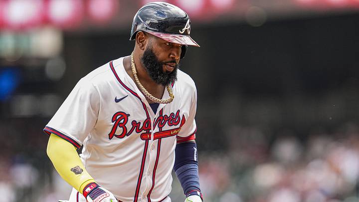 Marcell Ozuna (20) reacts after hitting a home run against the Washington Nationals during the eighth inning at Truist Park. 