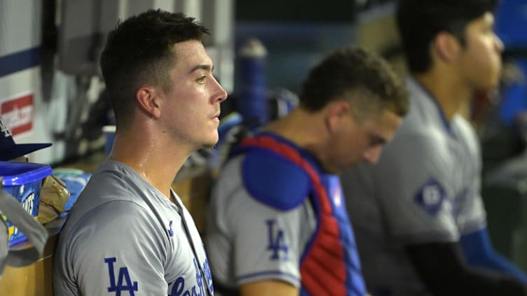 Sep 4, 2024; Anaheim, California, USA;  Los Angeles Dodgers starting pitcher Bobby Miller (28) sits in the dugout during the fifth inning against the Los Angeles Angels at Angel Stadium. Mandatory Credit: Jayne Kamin-Oncea-Imagn Images