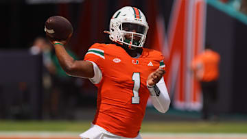 Sep 14, 2024; Miami Gardens, Florida, USA; Miami Hurricanes quarterback Cam Ward (1) throws the football before the game against the Ball State Cardinals at Hard Rock Stadium. Mandatory Credit: Sam Navarro-Imagn Images