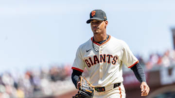 Apr 4, 2025; San Francisco, California, USA; San Francisco Giants pitcher Randy Rodríguez (73) walks off after closing out the inning during the third inning against the Seattle Mariners at Oracle Park. Mandatory Credit: Bob Kupbens-Imagn Images