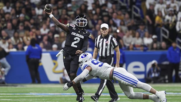 Dec 28, 2024; San Antonio, TX, USA; Colorado Buffaloes quarterback Shedeur Sanders (2) attempts a pass as Brigham Young Couga