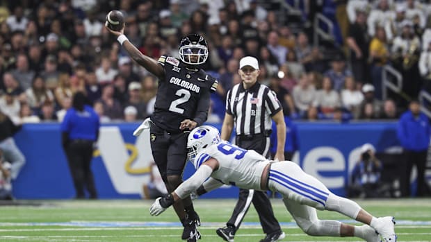 Dec 28, 2024; San Antonio, TX, USA; Colorado Buffaloes quarterback Shedeur Sanders (2) attempts a pass as Brigham Young Couga