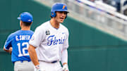 Jun 19, 2024; Omaha, NE, USA; Florida Gators first baseman Jac Caglianone (14) reacts after hitting a double against the Kentucky Wildcats during the first inning at Charles Schwab Field Omaha. Mandatory Credit: Dylan Widger-Imagn Images