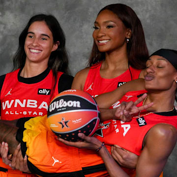 Washington Mystics' Sonia Citron, Brittney Sykes, and Kiki Iriafen take a photo before the 2025 WNBA All-Star Game 