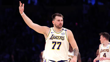 Mar 2, 2025; Los Angeles, California, USA; Los Angeles Lakers guard Luka Doncic (77) reacts to a play during the third quarter against the LA Clippers at Crypto.com Arena. Mandatory Credit: Jason Parkhurst-Imagn Images