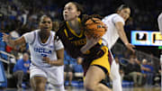 Minnesota guard Amaya Battle drives to the basket past UCLA guard Londynn Jones (3) during the first quarter at Pauley Pavilion presented by Wescom in Los Angeles on Feb. 2, 2025.