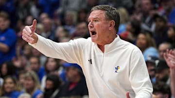 Dec 31, 2024; Lawrence, Kansas, USA; Kansas Jayhawks head coach Bill Self reacts during the second half against the West Virginia Mountaineers at Allen Fieldhouse. Mandatory Credit: Jay Biggerstaff-Imagn Images