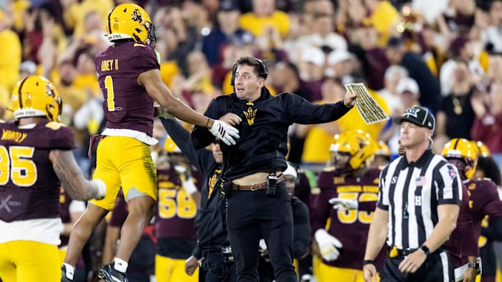 Nov 28, 2025; Tempe, Arizona, USA; Arizona State Sun Devils assistant special teams coordinator Jack Nudo (right) celebrates a play with defensive back Keith Abney II (1) against the Arizona Wildcats during the 99th Territorial Cup at Mountain America Stadium. Mandatory Credit: Mark J. Rebilas-Imagn Images
