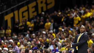 Missouri Tigers head coach Dennis Gates looks calmly as his team closes an upset versus No. 1 Kansas.