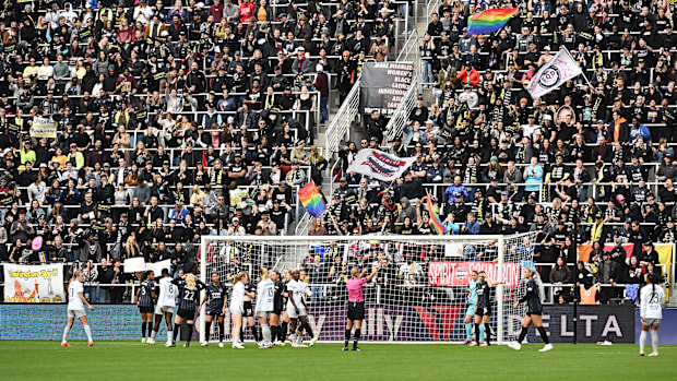 A view of the fans cheering on Washington Spirit against Bay FC in the 2024 NWSL Playoff quarterfinal.
