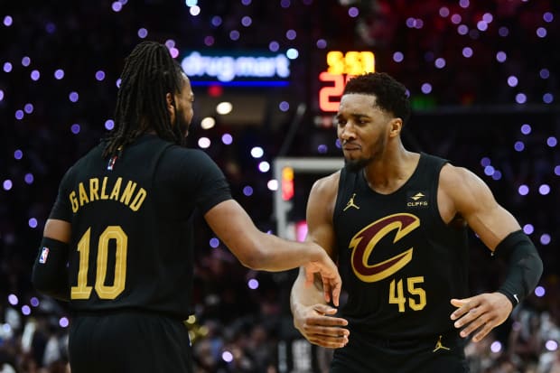 Darius Garland and Donovan Mitchell react after their game seven win 