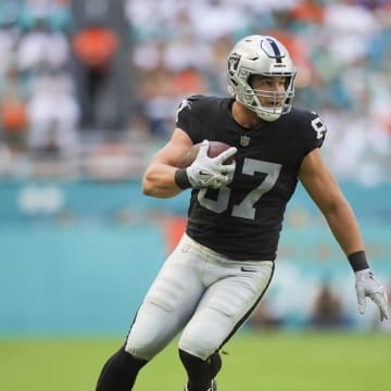 Nov 19, 2023; Miami Gardens, Florida, USA; Las Vegas Raiders tight end Michael Mayer (87)] runs with the football against the Miami Dolphins during the first quarter at Hard Rock Stadium. Mandatory Credit: Sam Navarro-USA TODAY Sports