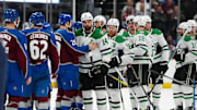 May 17, 2024; Denver, Colorado, USA; Dallas Stars left wing Jamie Benn (14) and Colorado Avalanche center Nathan MacKinnon (29) greet each other following a double overtime period in game six of the second round of the 2024 Stanley Cup Playoffs at Ball Arena. Mandatory Credit: Ron Chenoy-Imagn Images