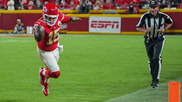 Oct 7, 2024; Kansas City, Missouri, USA; Kansas City Chiefs quarterback Patrick Mahomes (15) runs the ball and dives for a first down against the New Orleans Saints during the second half at GEHA Field at Arrowhead Stadium. Mandatory Credit: Denny Medley-Imagn Images