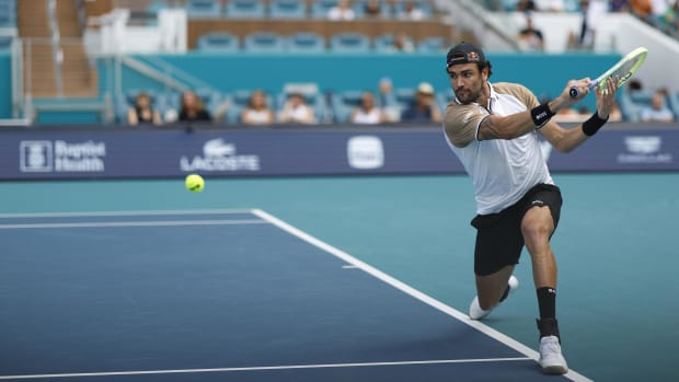 Berrettini winds up for a backhand.