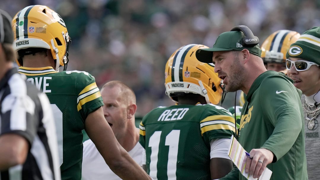Green Bay Packers quarterback coach Sean Mannion is shown congratulating quarterback Jordan Love (10) during the second quarter of their game Sunday, September 7, 2025 at Lambeau Field in Green Bay, Wisconsin. The Green Bay Packers beat the Detroit Lions 27-13. Green Bay Packers quarterback coach Sean Mannion is shown congratulating quarterback Jordan Love (10) during the second quarter of their game Sunday, September 7, 2025 at Lambeau Field in Green Bay, Wisconsin. The Green Bay Packers beat the Detroit Lions 27-13.