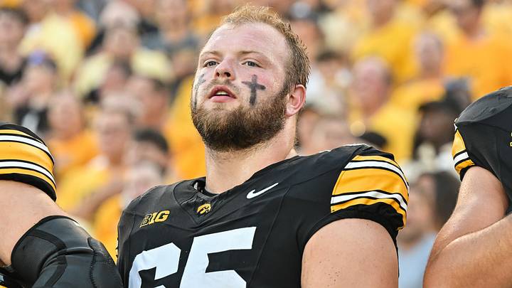 Sep 13, 2025; Iowa City, Iowa, USA; Iowa Hawkeyes offensive lineman Logan Jones (65) looks on before the game against the Massachusetts Minutemen at Kinnick Stadium. Mandatory Credit: Jeffrey Becker-Imagn Images