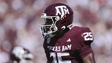 Sep 27, 2025; College Station, Texas, USA; Texas A&M Aggies safety Dalton Brooks (25) reacts after making a tackle during the first quarter against the Auburn Tigers at Kyle Field. Mandatory Credit: Troy Taormina-Imagn Images