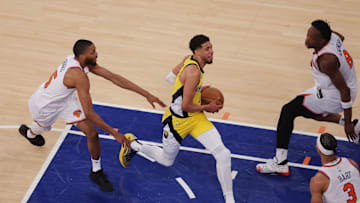 May 21, 2025; New York, New York, USA; Indiana Pacers guard Tyrese Haliburton (0) controls the ball against New York Knicks forward Mikal Bridges (25) in overtime during game one of the eastern conference finals for the 2025 NBA Playoffs at Madison Square Garden. Mandatory Credit: Brad Penner-Imagn Images