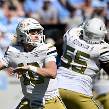 Oct 12, 2024; Chapel Hill, North Carolina, USA;  Georgia Tech Yellow Jackets quarterback Haynes King (10) loosks to pass in the first quarter at Kenan Memorial Stadium. Mandatory Credit: Bob Donnan-Imagn Images