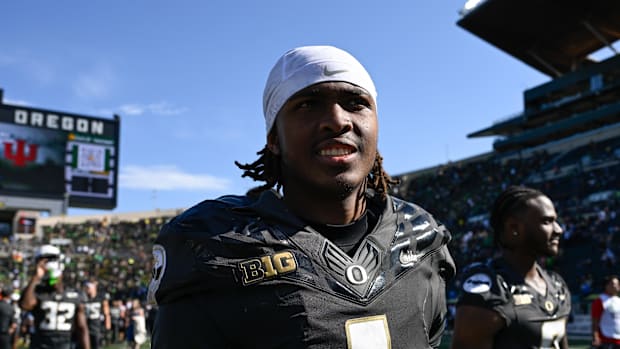 Oregon Ducks Dan Lanning Curt Cignetti Dakorien Moore Dante Moore Autzen Stadium Big Ten Fernando Mendoza 